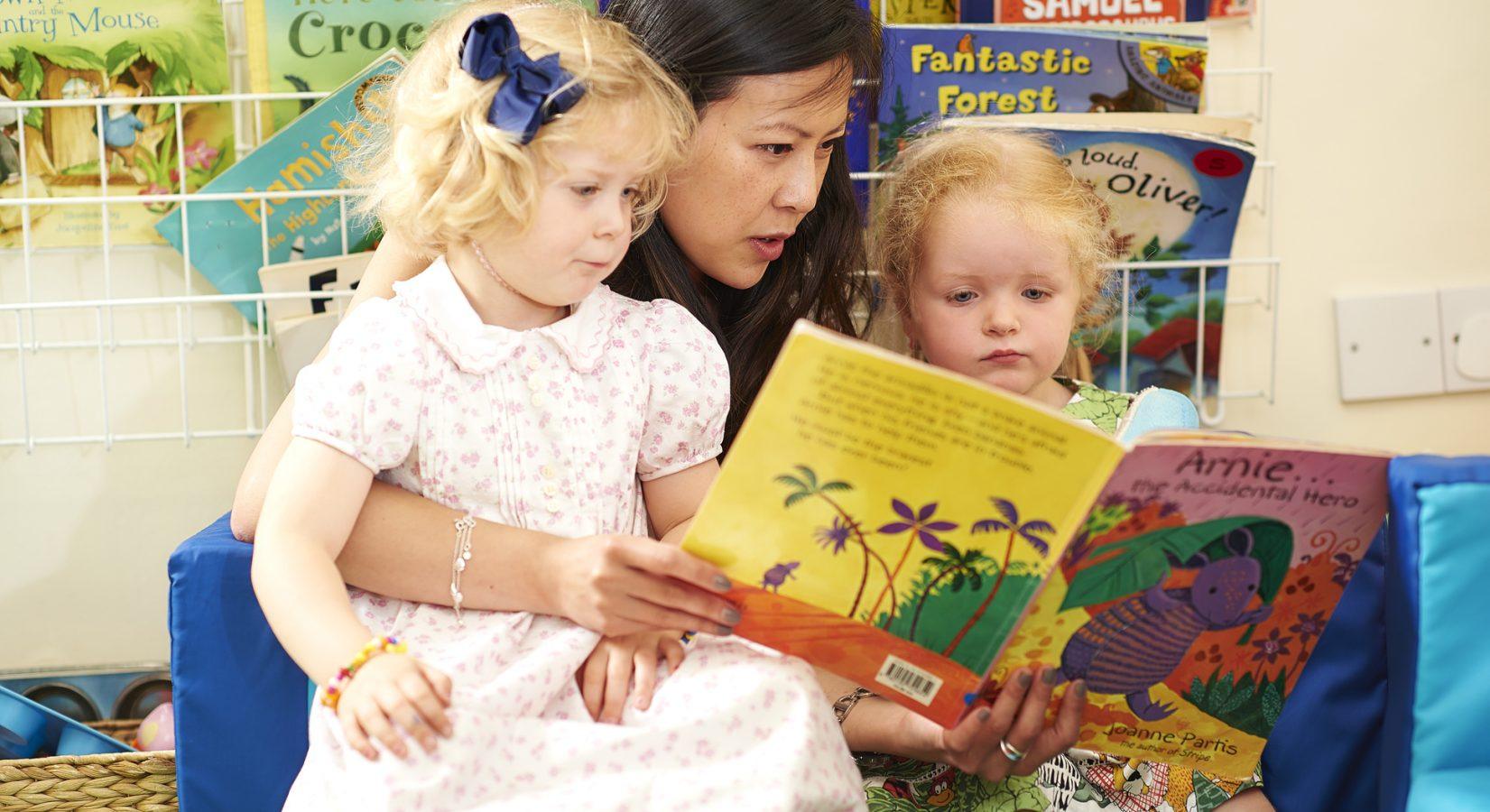 Children reading at The Minors Nursery